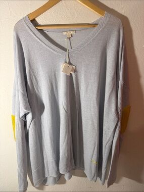 Lisa Todd Pale Blue V-Neck Sweater with Yellow Elbow Patches